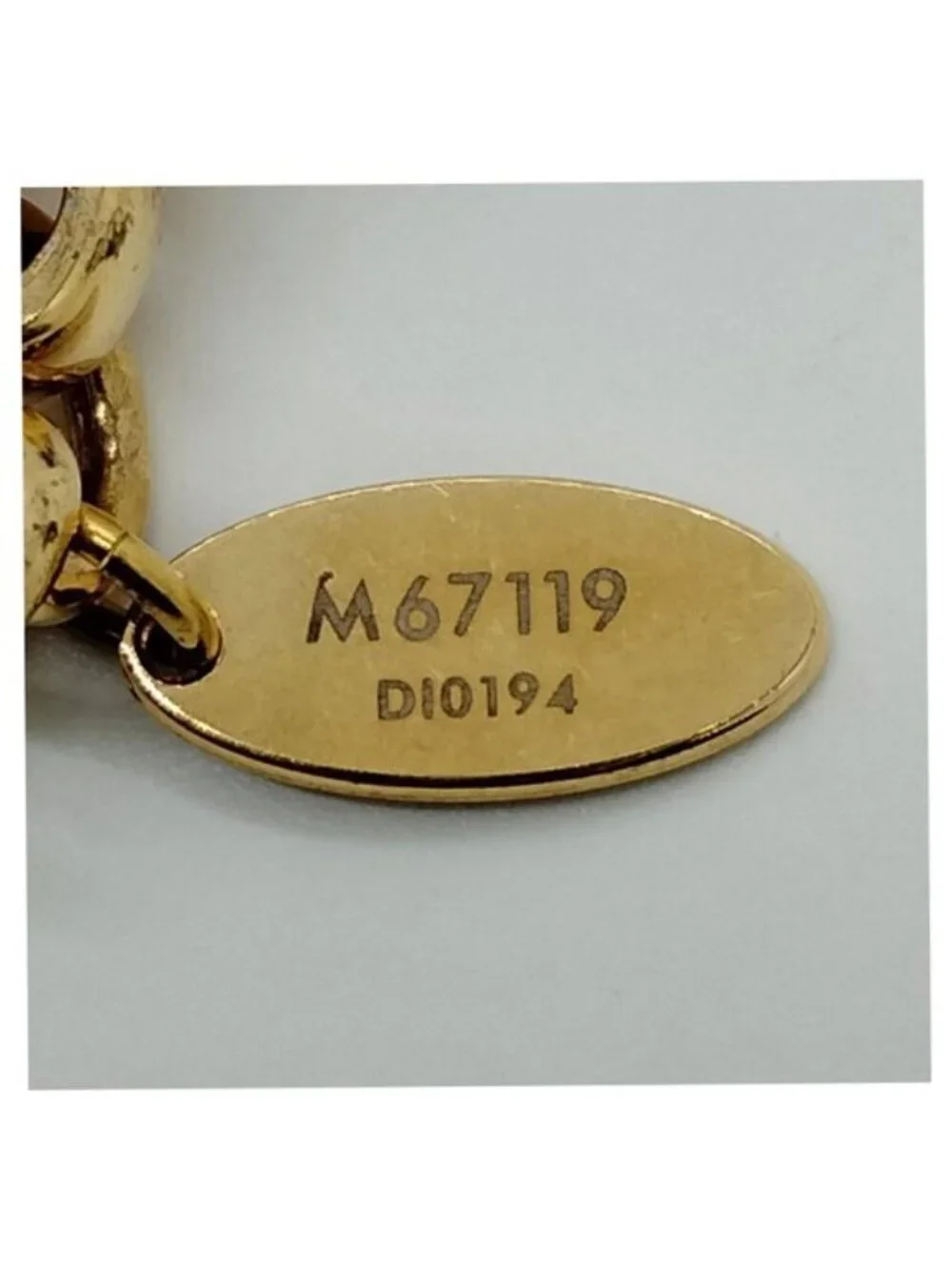 Authnetic Louis Vuitton LV Fleur Bag Charm & Key Holder Gold Tone